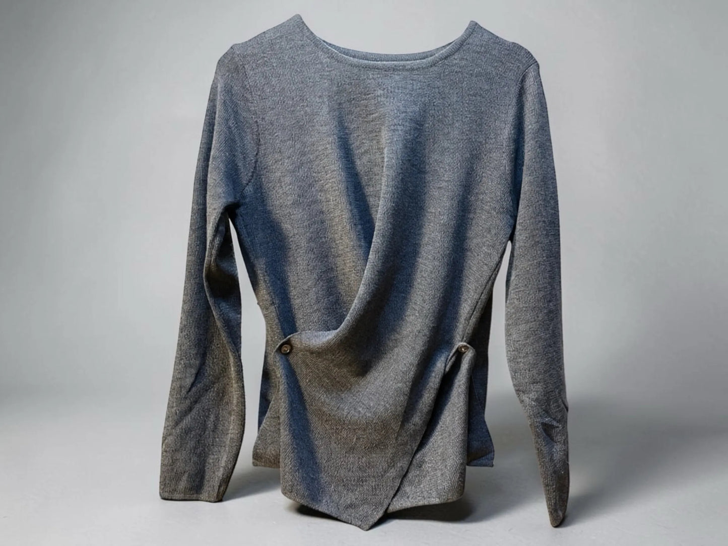 JJACollection grey knit long sleeve asymmetrical wrap top with button detail.